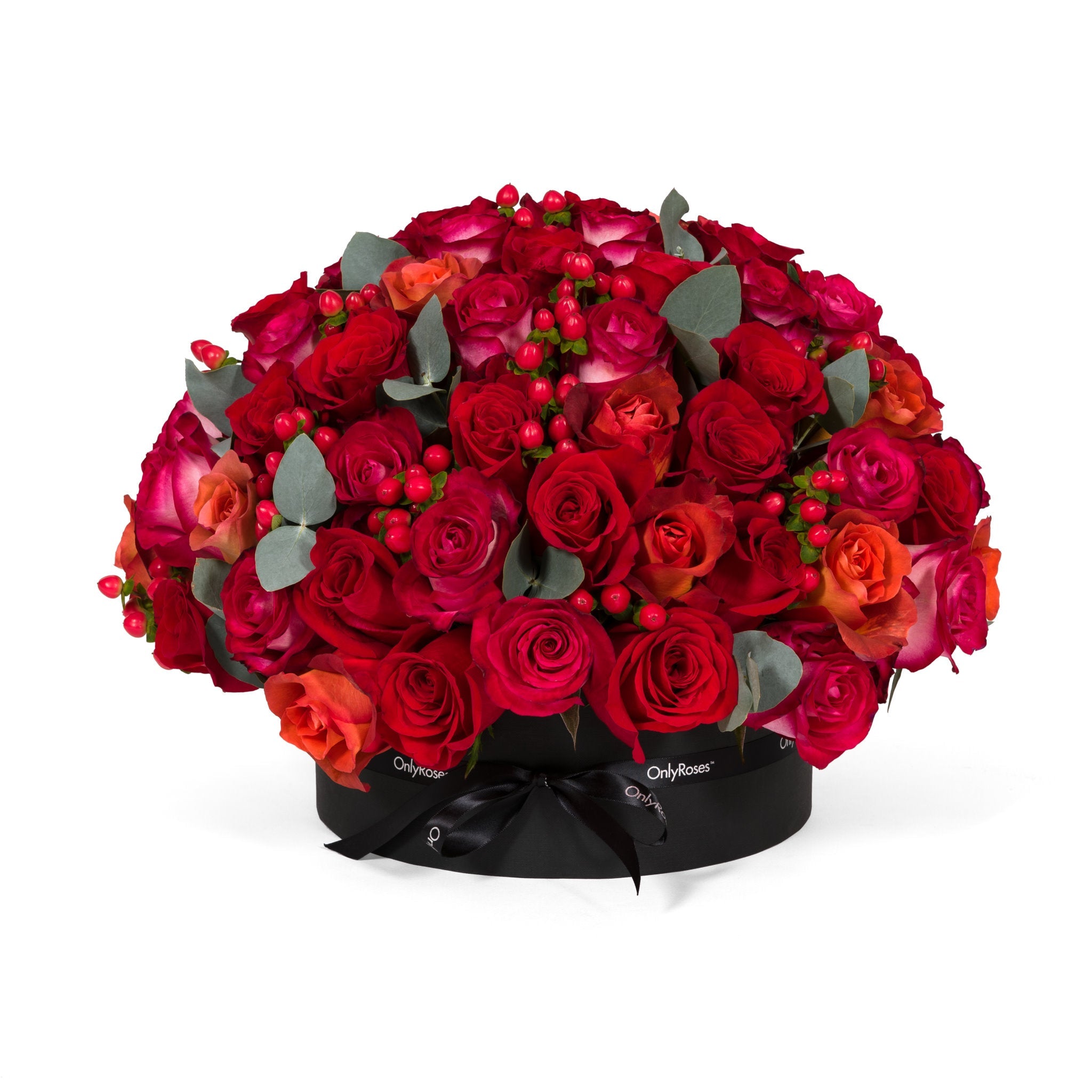 Bouquet of red and pink roses with green leaves on a white background