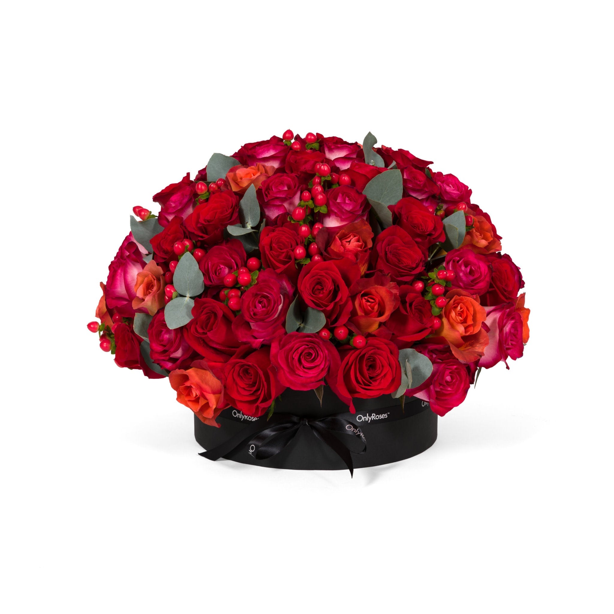 Bouquet of red and pink roses with green leaves on a white background