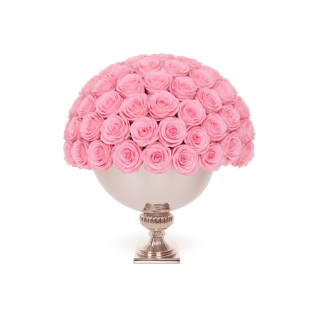 Decorative sphere filled with pink roses on a white background