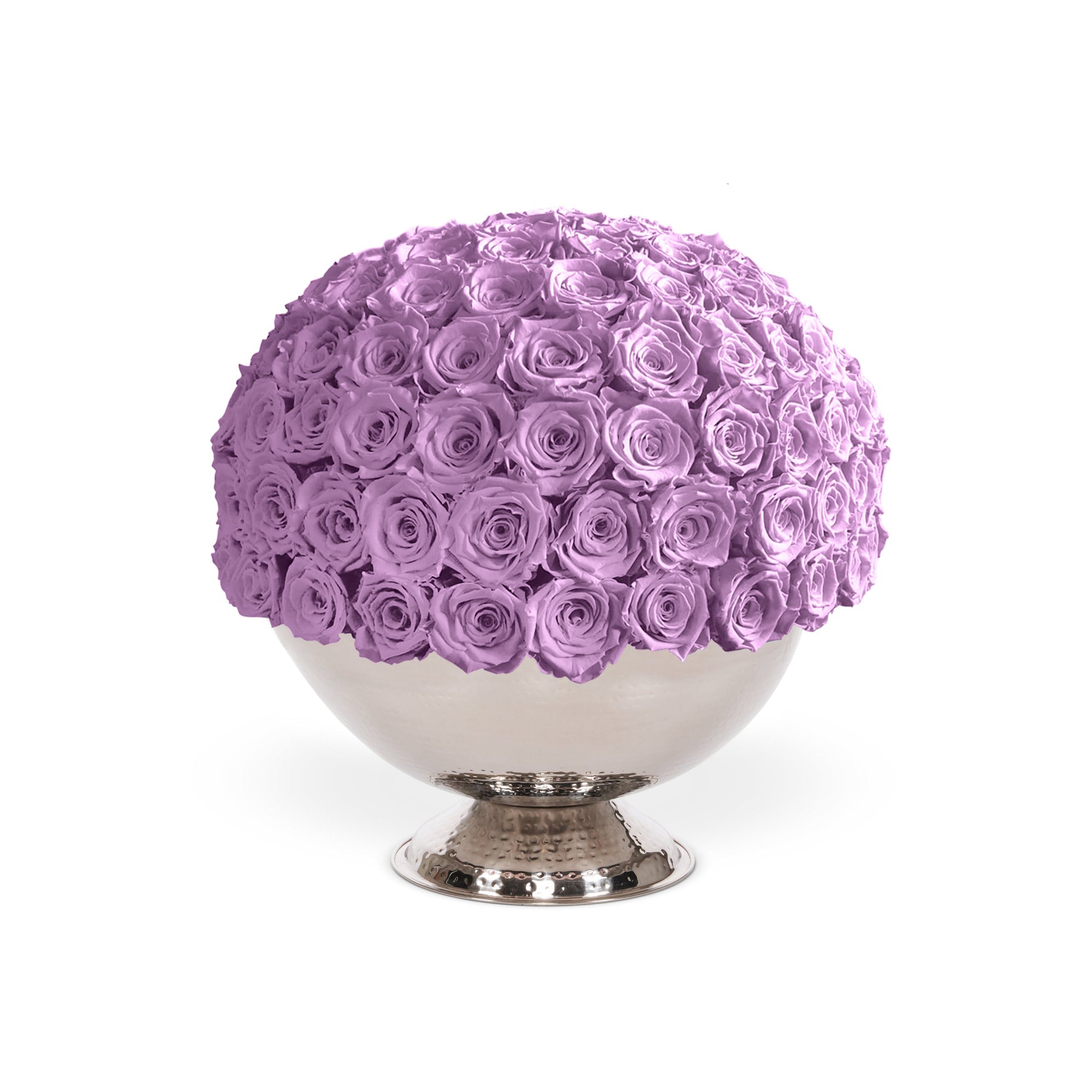 Spherical arrangement of purple roses on a white pedestal against a white background