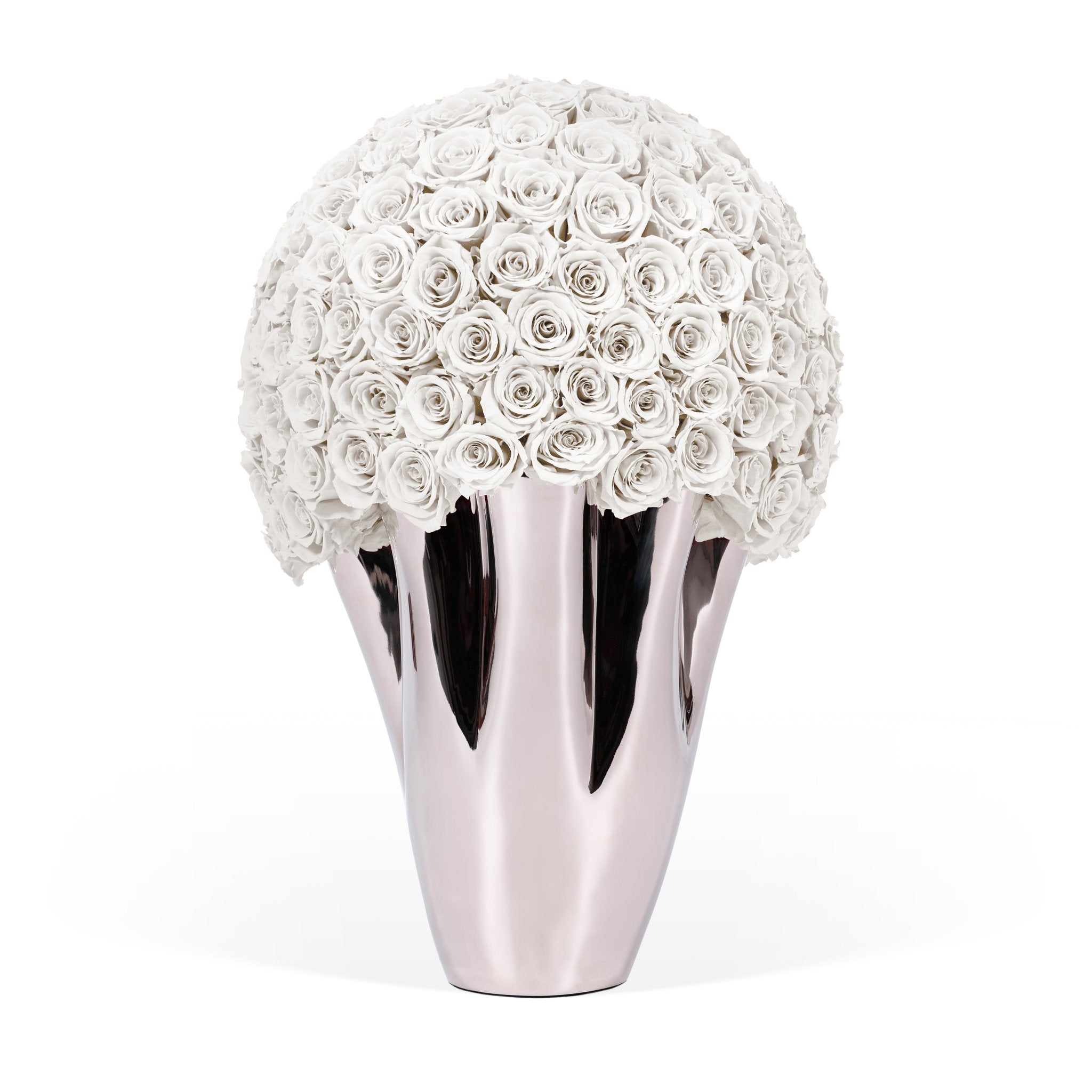 Decorative vase with white rose-like flowers and a metallic base on a white background