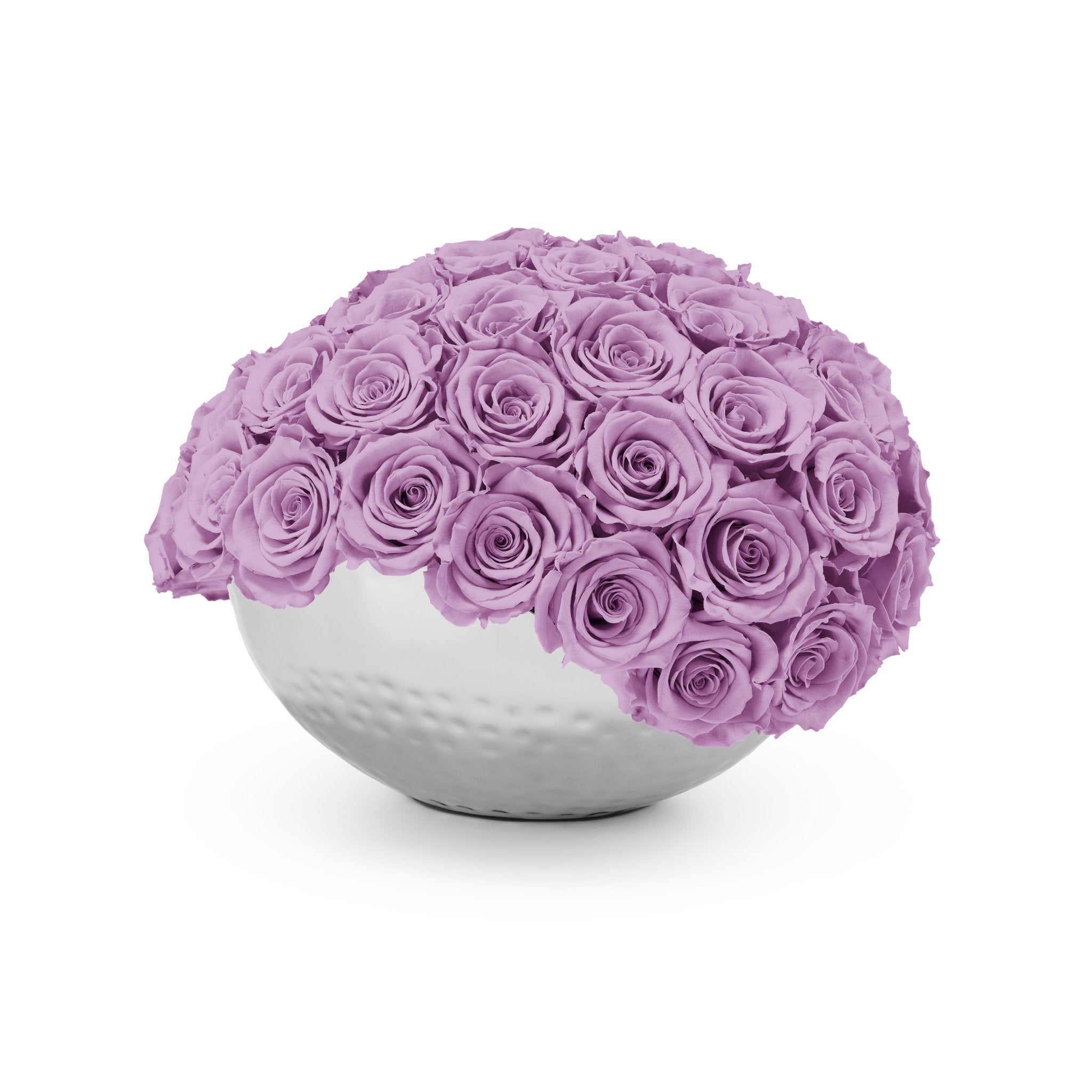 Spherical arrangement of purple roses in a white vase on a white background