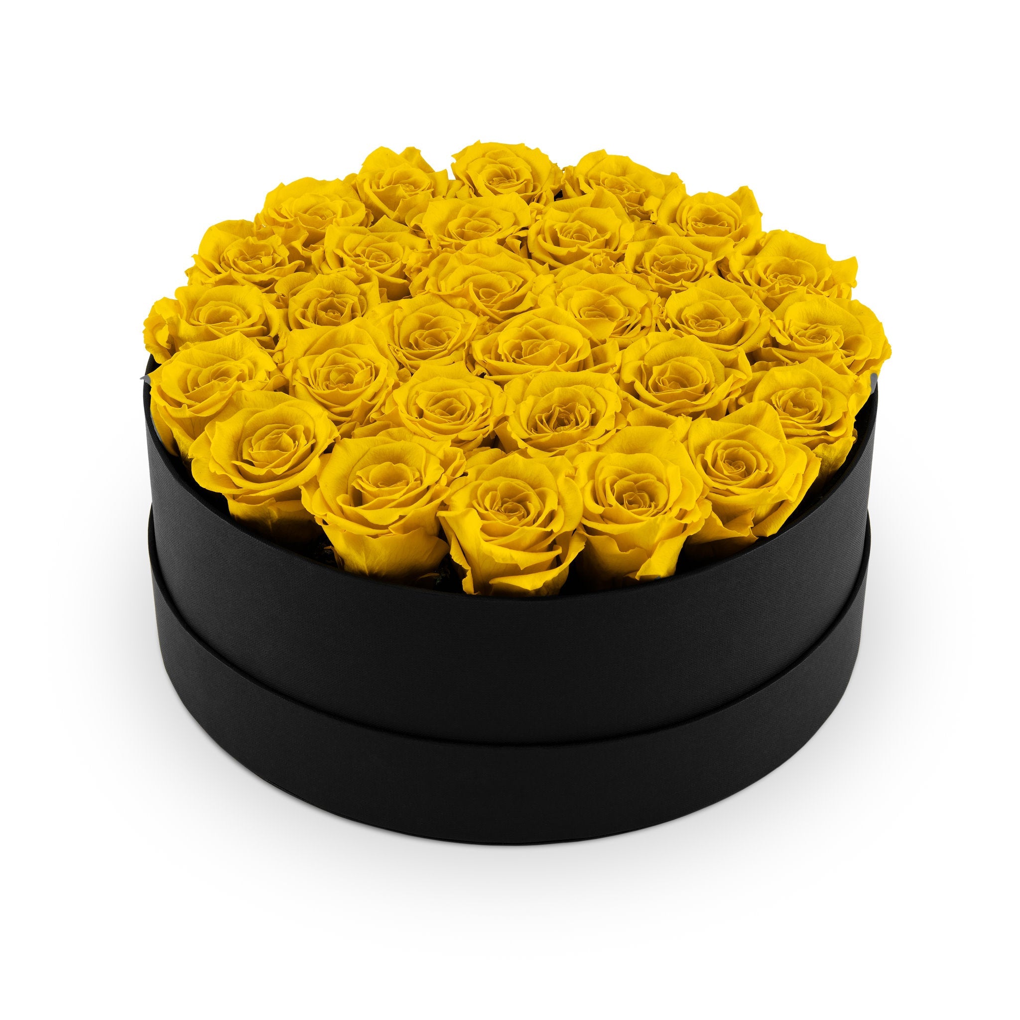 Round black box filled with yellow roses on a white background