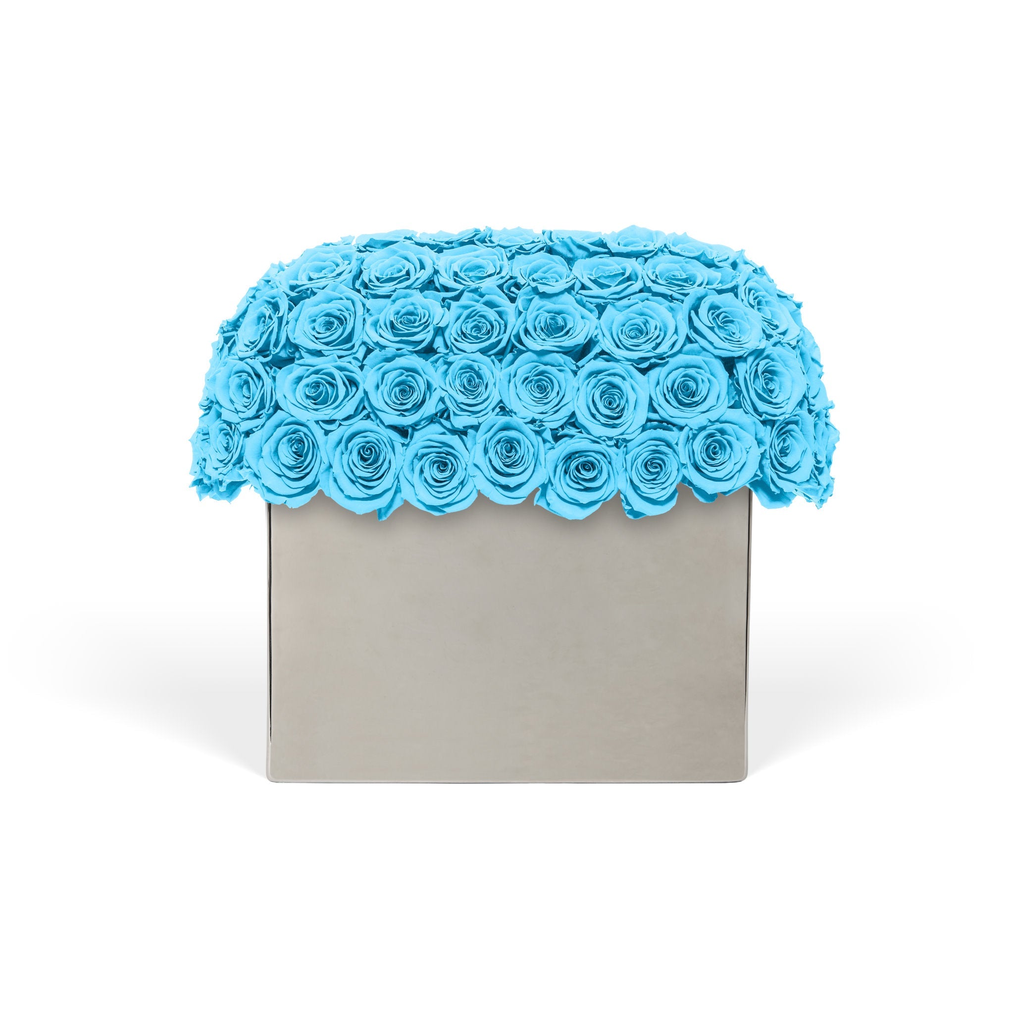 Decorative box with blue rose arrangement on a white background