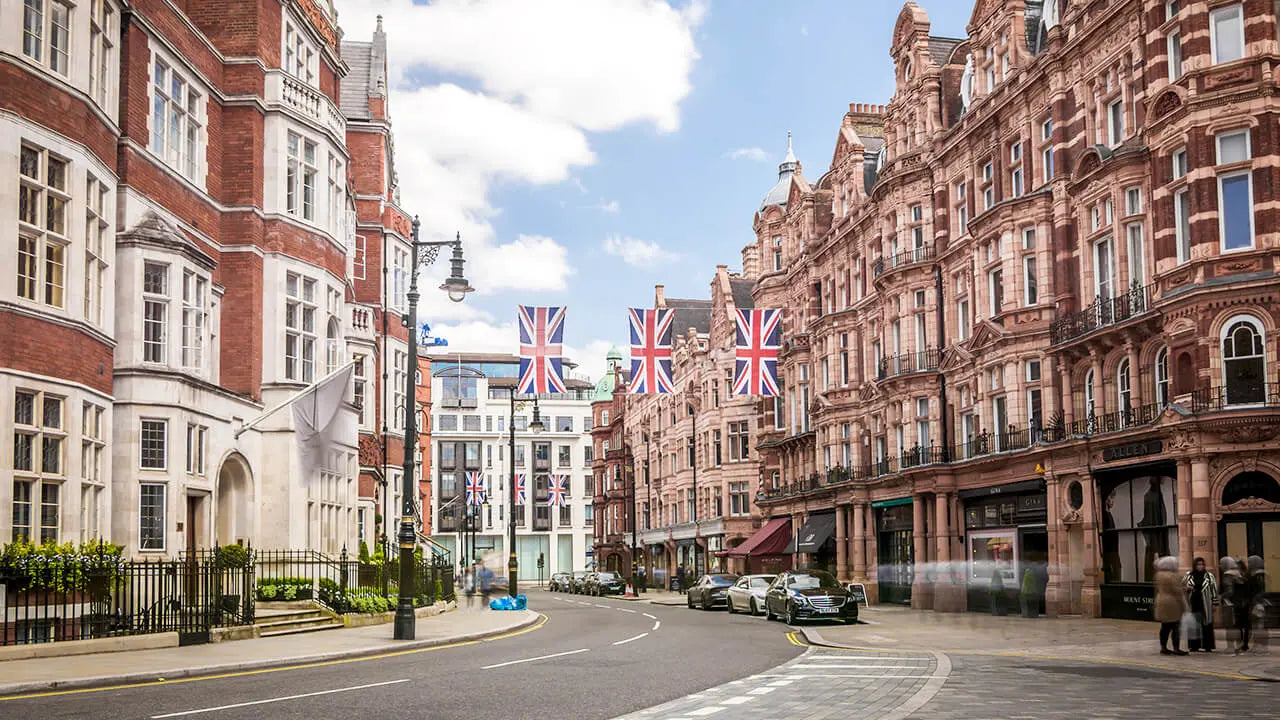 Street scene in a city with British flags on buildings