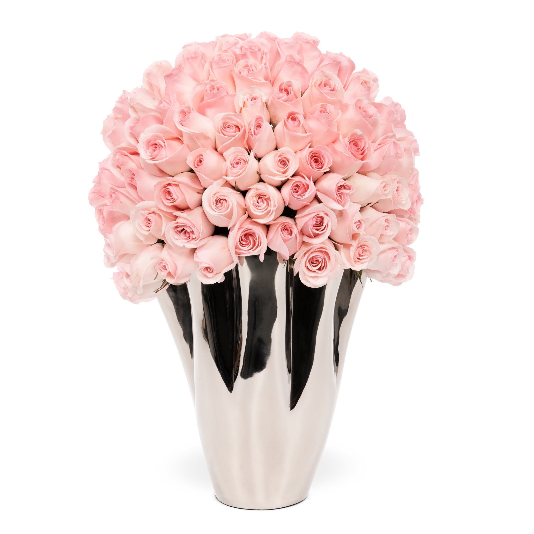 Silver vase with pink roses on a white background