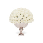 Bouquet of white roses in a decorative vase on a white background