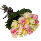 Bouquet of pink, yellow, and white roses with a dark ribbon on a white background