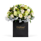 Floral arrangement in a black 'Only Roses' bag on a white background