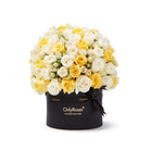 Bouquet of yellow and white roses in a black box with 'OnlyRoses' branding on a white background.