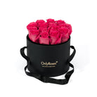 Black round box with pink roses and 'Only Roses' branding on a white background