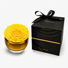 Yellow flower arrangement in a glass bowl with a black box labeled 'Only Roses' on a white background