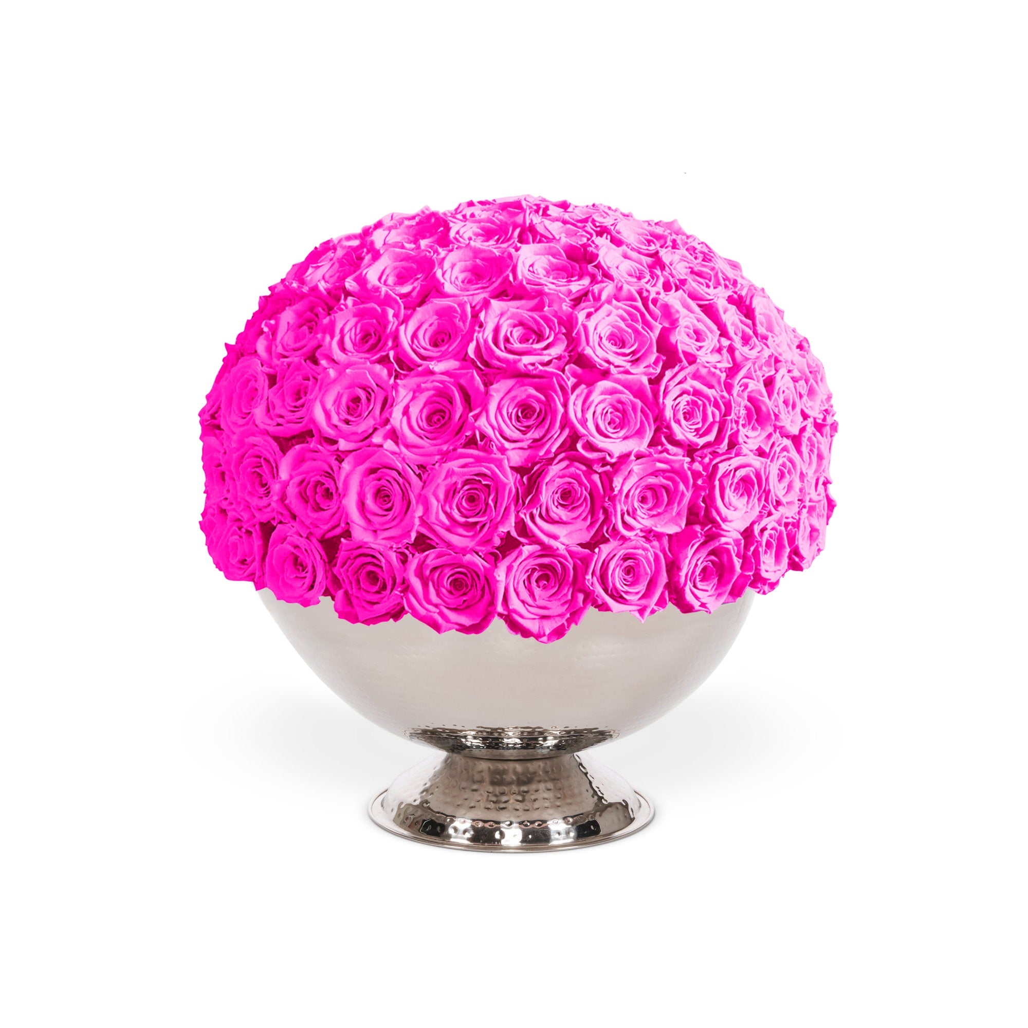 Spherical arrangement of pink roses on a white pedestal against a white background