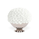 Decorative sphere with white rose pattern on a white background