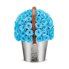 Bouquet of blue roses in a silver vase with a brown handle on a white background