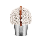 Decorative vase with white flowers and a brown handle on a white background