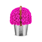 Basket filled with pink roses on a white background