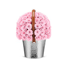 Basket filled with pink roses on a white background