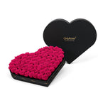 Heart-shaped box of pink roses with 'Only Roses' branding on a white background