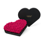 Heart-shaped box of pink roses with 'Only Roses' branding on a white background