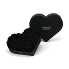 Heart-shaped box of black roses with 'OnlyRoses' branding on a white background