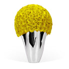 Silver vase with a large ball of yellow roses on a white background