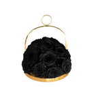Gold hoop with black roses on a white background