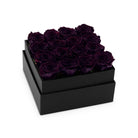 Black box with purple roses on a white background