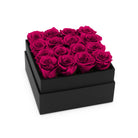 Black box with pink roses on a white background