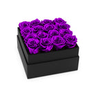 Black box with purple roses on a white background