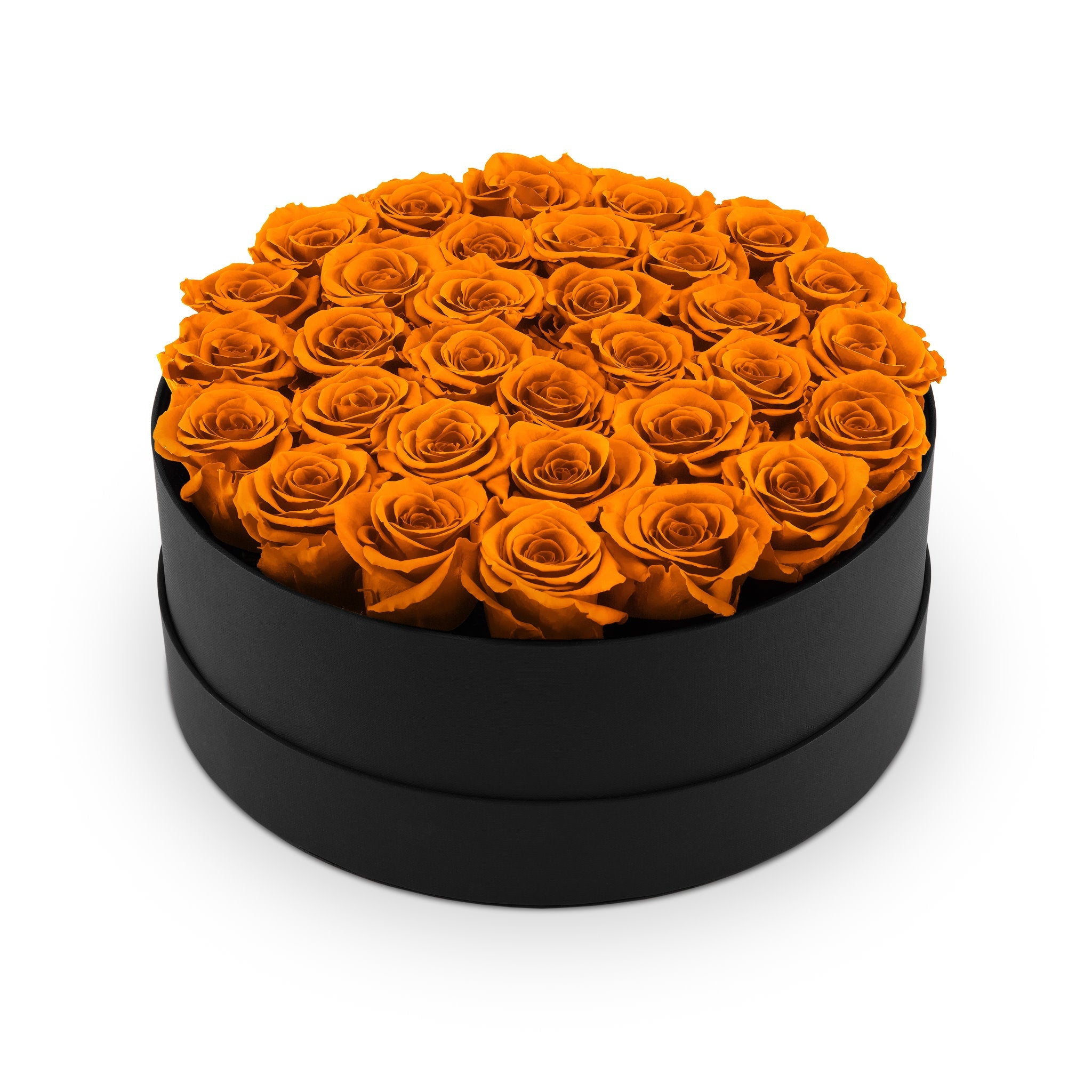 Black round box filled with orange roses on a white background