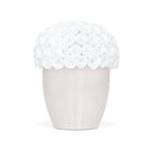 White vase with lace top on a white background