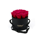 Black box with bright pink roses and 'Only Roses' branding on a white background