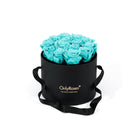 Black box with turquoise roses and 'Only Roses' branding on a white background