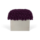 Square box with a scalloped purple rose top on a white background