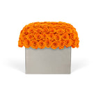 Decorative box with orange roses on a white background