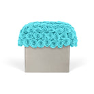 Decorative box with turquoise rose accents on a white background